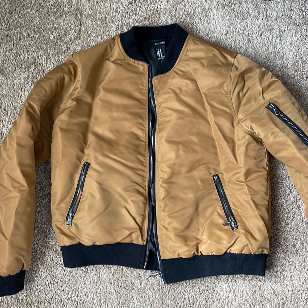 Brown and black bomber jacket